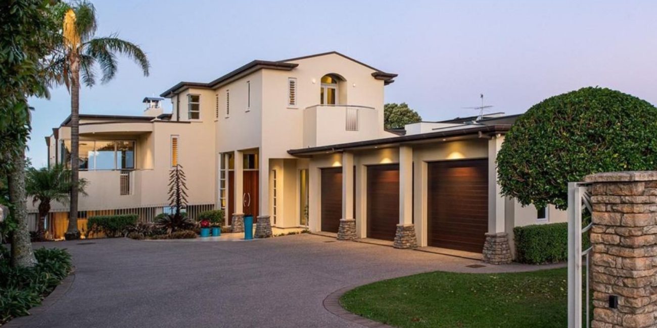 Exterior of a four-storey home in Belmont, Auckland, where Vestner installed a custom home lift